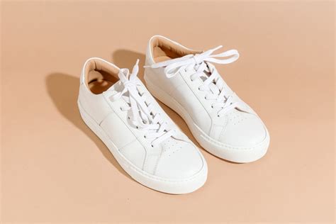 luxury brand white sneakers.